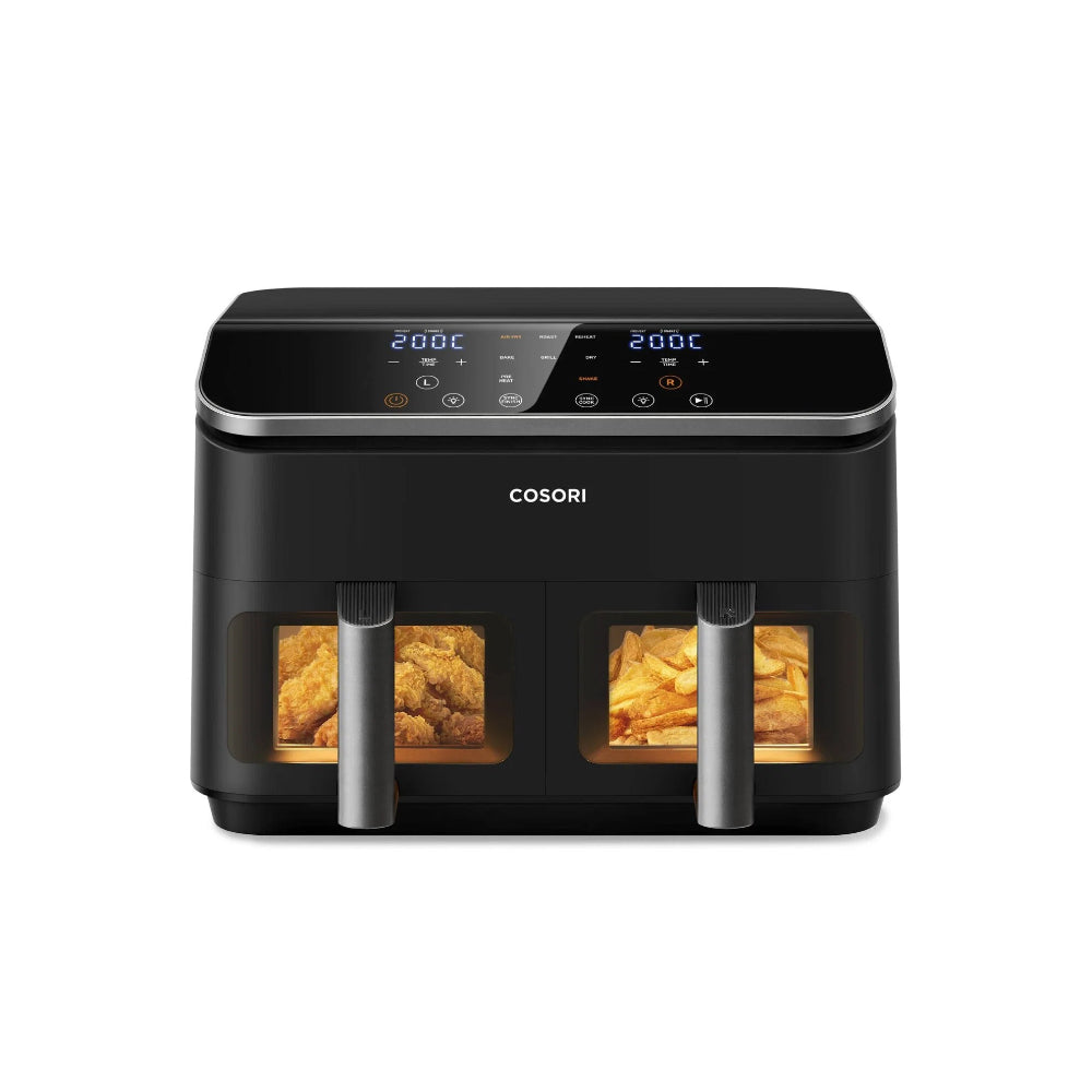 COSORI dual basket air fryer with viewing windows, cooking crispy fried chicken and French fries