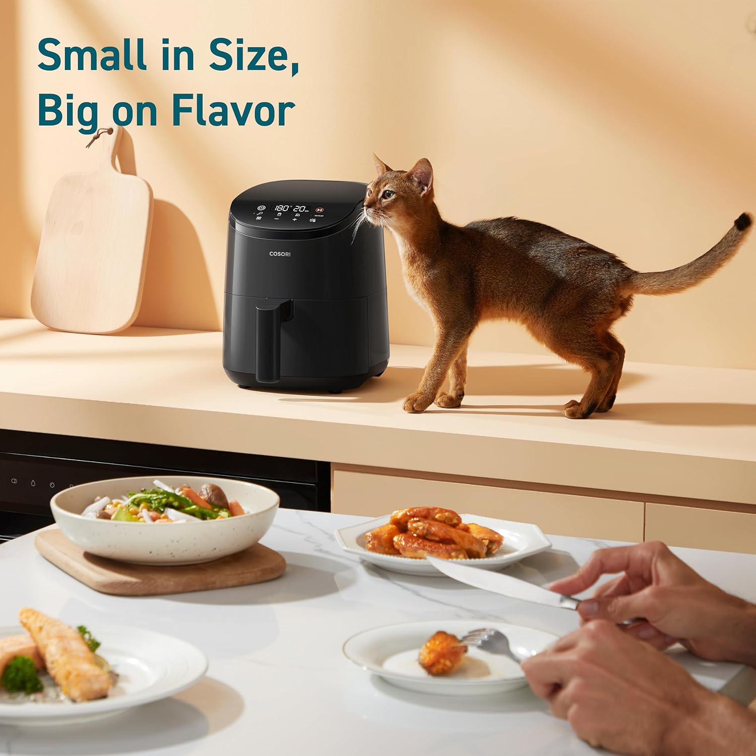 COSORI mini air fryer on kitchen counter, compact size for small kitchens and big flavors
